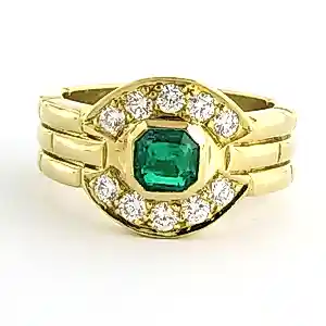 Acheter18k geelgouden ring bezet met smaragd en briljant geslepen diamant 0.50 ct? Enchérissez de 1450!