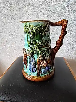AcheterKeramiekfabriek Nimy - Majolica kruik van Mouzin Leach & Cie? Enchérissez de 250!