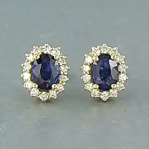 Acheter18k gouden oorknoppen met saffier en briljant geslepen diamant tot. 0.52ct? Enchérissez de 1200!