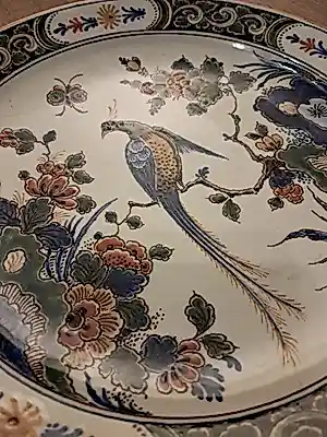 Buy Porceleyne Fles - Wandbord pauw/paradijsvogel? Bid from 25!