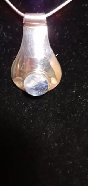 In nieuwstaat Zilveren ketting en hanger gezet met maansteen kopen? Bied vanaf 35!