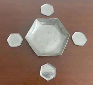 Curiosa - J.J. Davids Amsterdam - Art Deco handgehamerde zilvertinnen onderzetter set kopen? Bied vanaf 30!