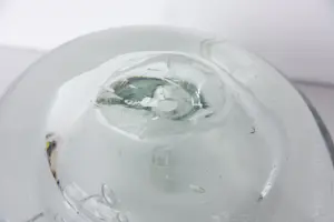 Onbekend - Zwaar rond glasobject met gedraaide vormen kopen? Bied vanaf 60!