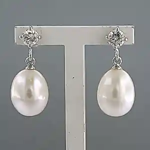 Buy 18k witgouden oorhangers met parel en briljant geslepen diamant tot. 0.40 ct? Bid from 460!