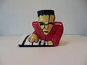 Herman Brood - Sculptuur van Kunsthars DE PIANIST incl C.O.A. kaufen? Bieten Sie von 89!