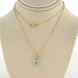 14k gouden collier met hanger bezet met blauwe topaas tot. 0,90ct - 40 cm lang verkauft für € 220!