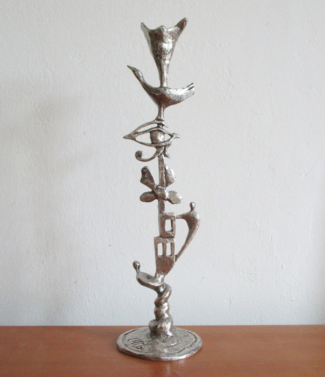 Corrie Ammerlaan-van Niekerk: kandelaar met figuratieve voorstellingen kopen? Bied vanaf 20!