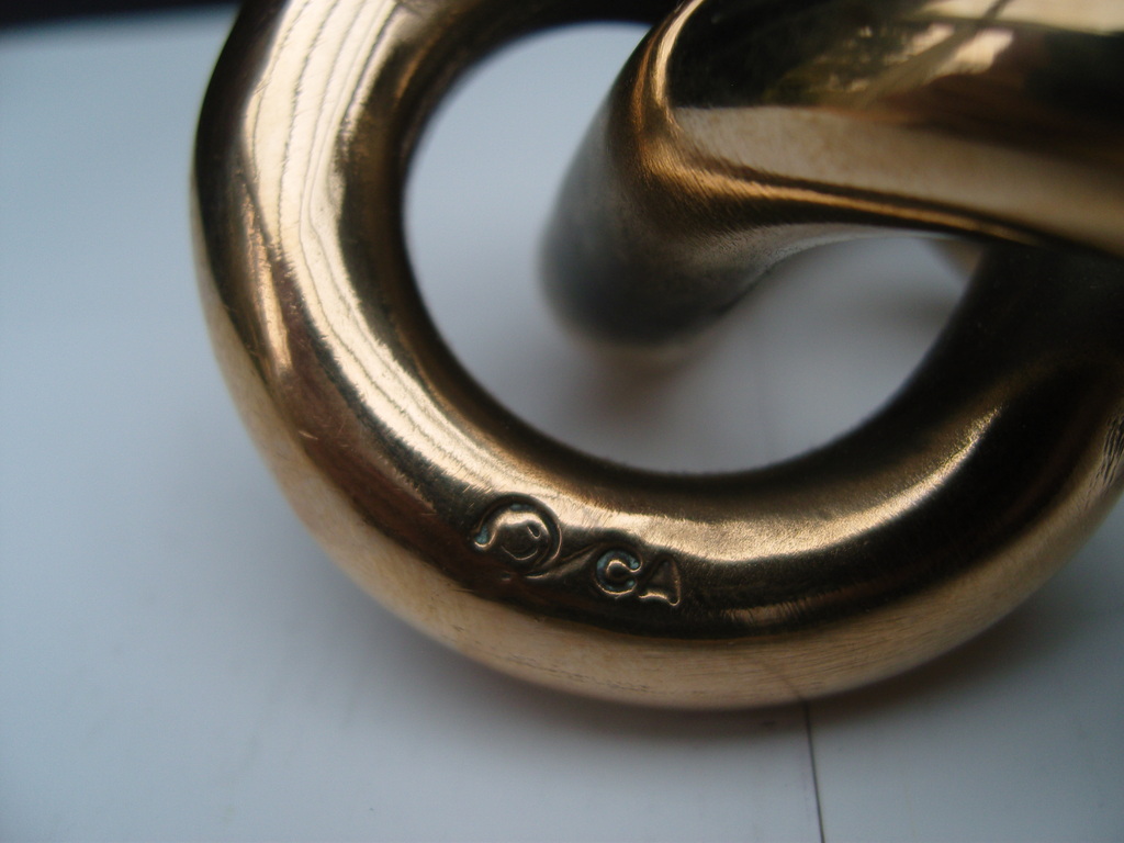 M C Escher: Oneindige knoop in brons kopen? Bied vanaf 60!