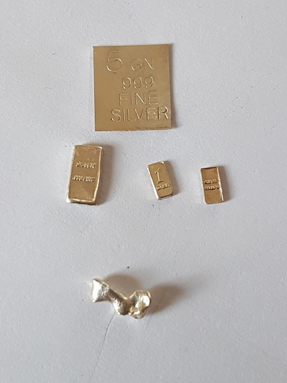 Blokken van puur zilver met gratis een platina nugget kopen? Bied vanaf 1!