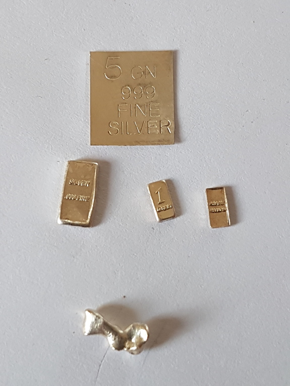 Blokken van puur zilver met gratis een platina nugget kopen? Bied vanaf 1!