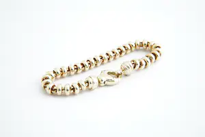 44- Aparte,  14 karaats gouden kinder/dames "ringetjes" model armband kopen? Bied vanaf 430!