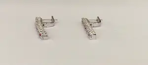 18 karaat witgouden oorstekers met diamanten en robijnen kopen? Bied vanaf 1100!