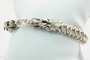 74 - Zware en aparte 2e gehalte zilveren dragon of draken armband kopen? Bied vanaf 90!