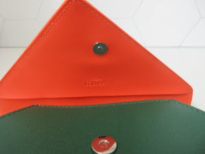Jan Taminiau - Groen Oranje Clutch uitgevoerd voor KLM kopen? Bied vanaf 24!