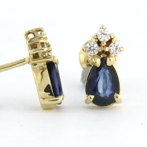 14k geelgouden oorknoppen bezet met saffier 1,20ct en briljant geslepen diamant kopen? Bied vanaf 260!