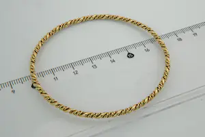 4 - Fraai afgewerkte 14Krt geel gouden  armband - gedraaid model kopen? Bied vanaf 395!