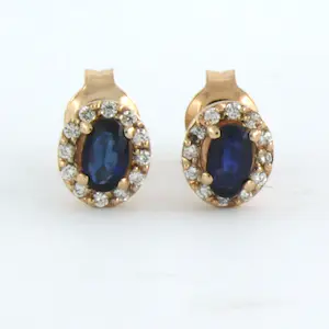 Acheter14k rose gouden entourage oorknoppen bezet met robijn en diamant 0.13 ct? Enchérissez de 210!
