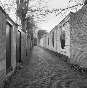 Willem Hopman - Ingelijste ets , Gedempte Baansloot Alkmaar kopen? Bied vanaf 35!