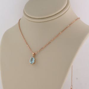 14K Goud - rood gouden collier met hanger bezet met topaas kopen? Bied vanaf 160!
