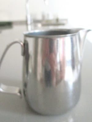 Alessi - Een peper en zoutvaatje, een melk-kannetje en een suikerpotje van Alessi kopen? Bied vanaf 12!