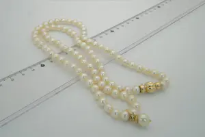 6 - Klassiek cultive parel ketting met parel hanger. 14krt geelgouden  sluiting kopen? Bied vanaf 280!