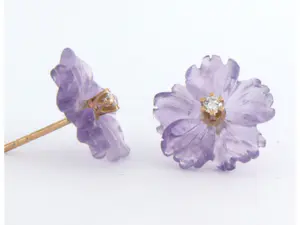 18k rosé gouden oorknoppen met amethist en diamant kopen? Bied vanaf 165!