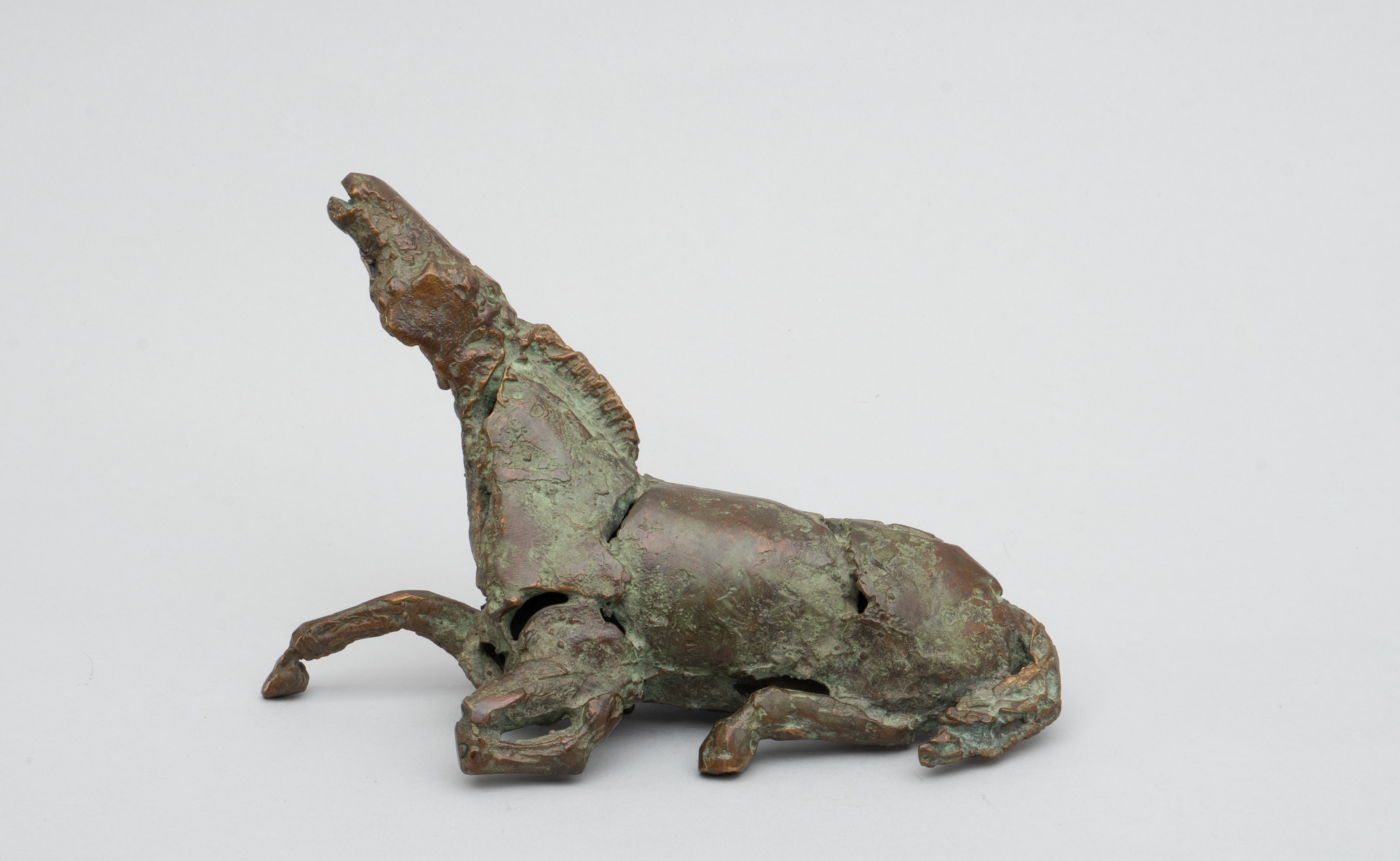 Buy Jan Desmarets - brons: Liggend paard? Bid from 1500!