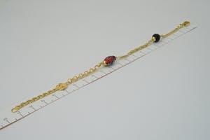 2523-  Surinaams 18 karaats geel-gouden zg. Alla Kondre armband - gekeurd kopen? Bied vanaf 180!