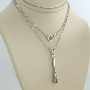 14k gouden collier en hanger met peridot en bolsjewiek geslepen diamant kopen? Bied vanaf 410!