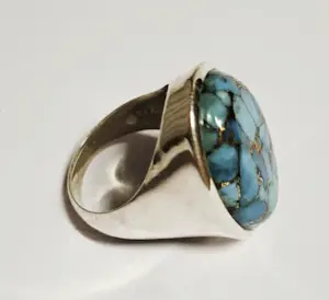 Nieuwe zilveren ring met ovale hoogglans turkoois kopen? Bied vanaf 75!