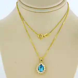 14k gouden collier en hanger bezet met topaas en briljant geslepen diamant verkocht voor € 320!