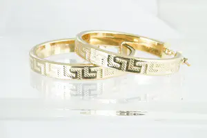 07 -  Elegante set 18 karaats geel-gouden dames "Creolen" met Griekse sleutels kopen? Bied vanaf 140!