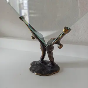 Corry Ammerlaan - Bronzen fotolijst met figuren. kopen? Bied vanaf 20!