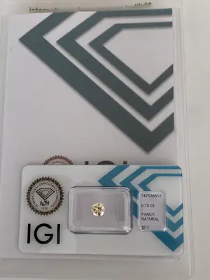 AcheterIGI-gecertificeerde natuurlijke Fancy Light Yellow diamant,0,78 karaat? Enchérissez de 1200!