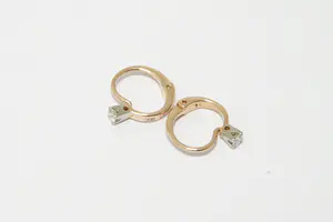 79 - 1 paar charmante 14krt rosé-gouden oorclips met 0.15ct diamant kopen? Bied vanaf 80!