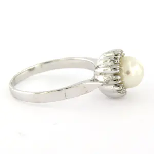 14k wit gouden ring bezet met parel en single cut geslepen diamanten tot. 0.05ct kopen? Bied vanaf 310!