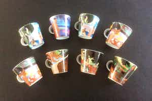 Niet of onleesbaar gesigneerd - ACHT “GAUGUIN” ESPRESSO KOPJES verkocht voor € 1!