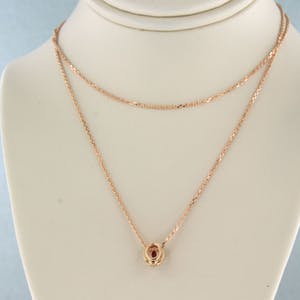 14k gouden collier/hanger met robijn en briljant geslepen diamant tot. 0.10ct kopen? Bied vanaf 200!
