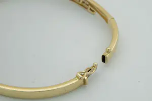 76 - Elegante bicolor 14Krt gouden dames armband met 10 diamanten (0.20ct) kopen? Bied vanaf 490!