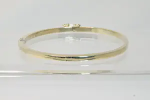 36 - 14 karaats gouden bicolor stijve armband met diamant ca 0.15 crt briljant kopen? Bied vanaf 990!