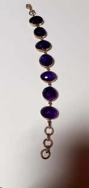 Nieuw zilveren armband bezet met natuurlijke ovale facetgeslepen amethyst kopen? Bied vanaf 100!