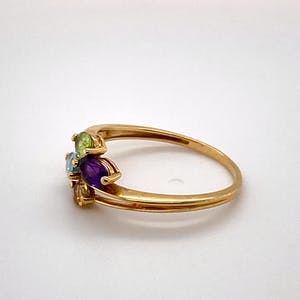 handgemaakte 18kt gouden ring met kleur edelstenen maat 54(17,5) 2,10 gr kopen? Bied vanaf 120!