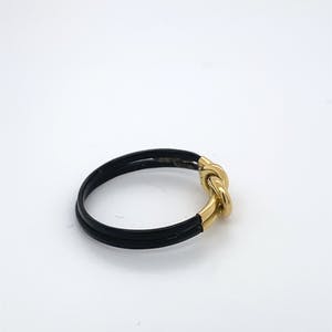 18kt gouden ring+olifantenhaar, maat 51/16,25, 0,46 gr kopen? Bied vanaf 50!
