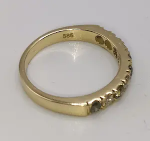 Gouden ring met 9 diamanten kopen? Bied vanaf 290!