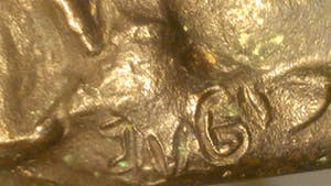 Brons (Onbekend) - liggend lezende vrouw JVG kopen? Bied vanaf 39!