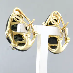 Acheter18k bicolour gouden oorclips met onyx en briljant geslepen diamant tot. 0.20ct? Enchérissez de 1400!