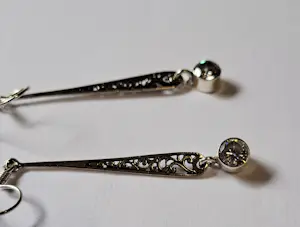 Nieuwe fijne, opengewerkte zilveren oorbellen met zirikonia kopen? Bied vanaf 40!