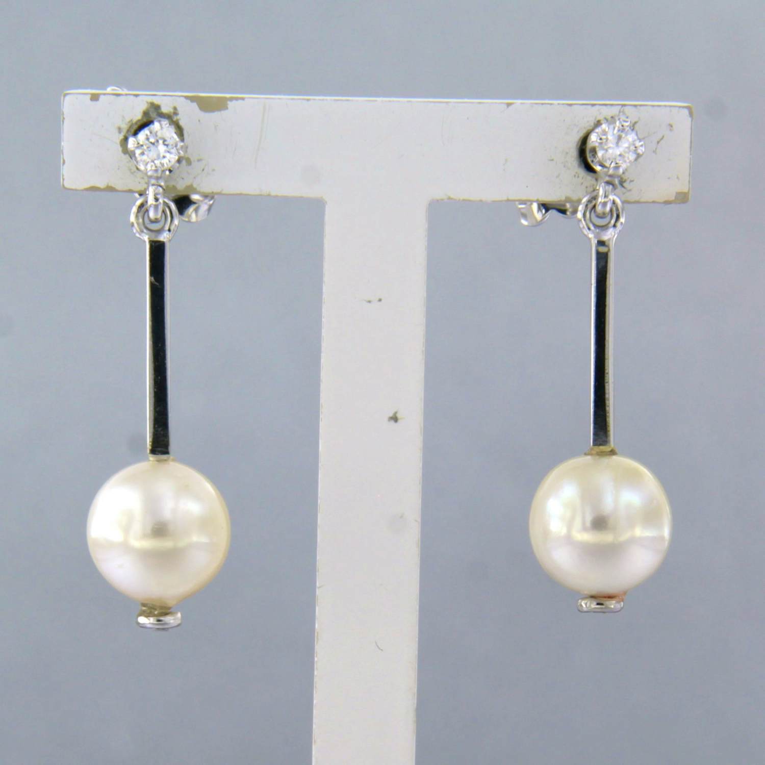 14k wit gouden oorhangers met parel en briljant geslepen diamant tot.0.06ct kopen? Bied vanaf 290!