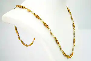 Lang Surinaams 18Krt geel-gouden zg. "Piet-Piet"of Nugget collier -  gekeurd verkocht voor € 100!