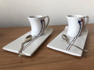 Corry Ammerlaan - 2 Kop en schotels met lepeltjes. kopen? Bied vanaf 15!